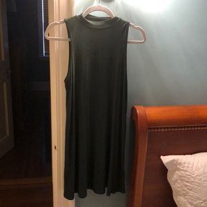 Green sleeveless high neckline dress